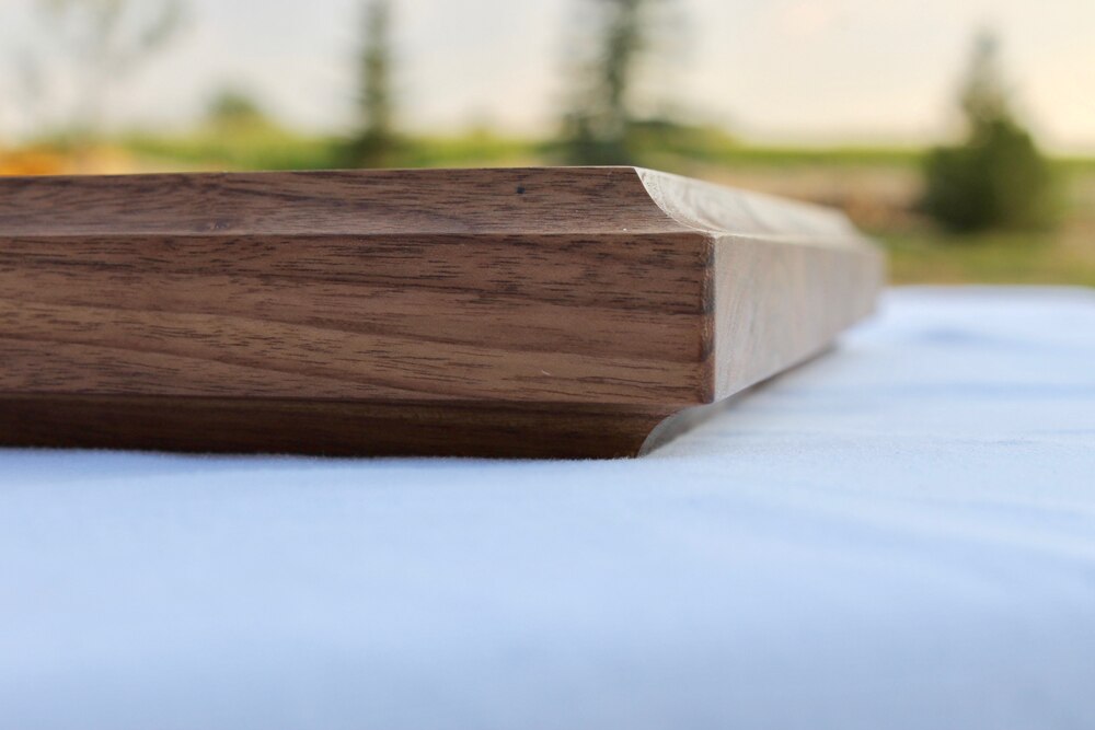 https://www.woodcuttingboardstore.com/wp-content/uploads/2020/06/18x20x1.5-Thick-Walnut-Wood-Cutting-Board-wFREE-Board-Butter6.jpg